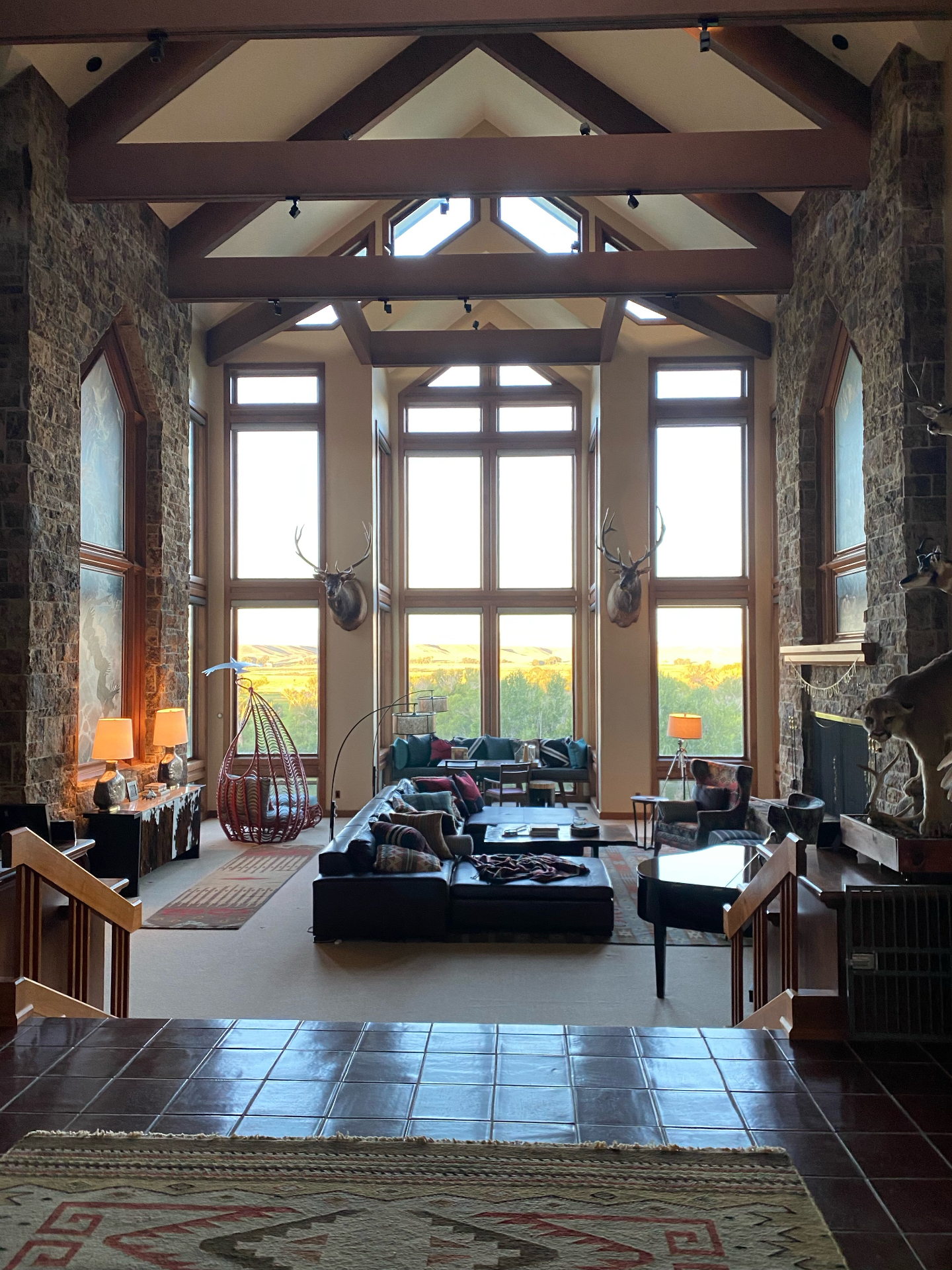 Great room with vaulted beams and valley views